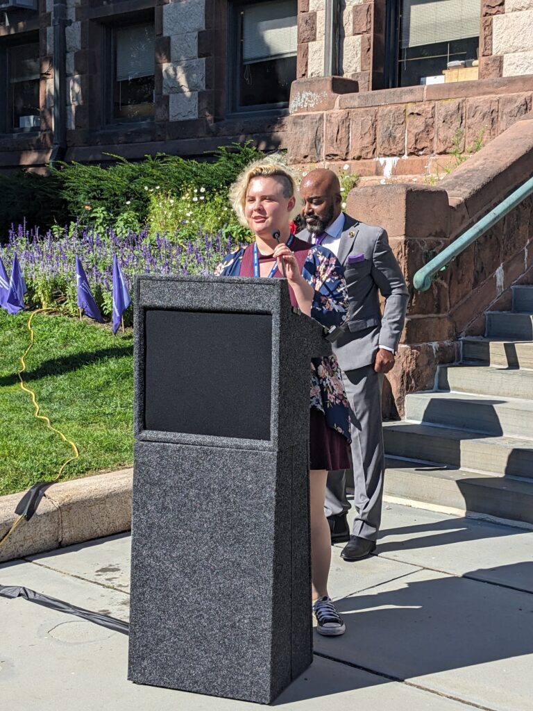 Staff speaking at the International Overdose Awareness Day.